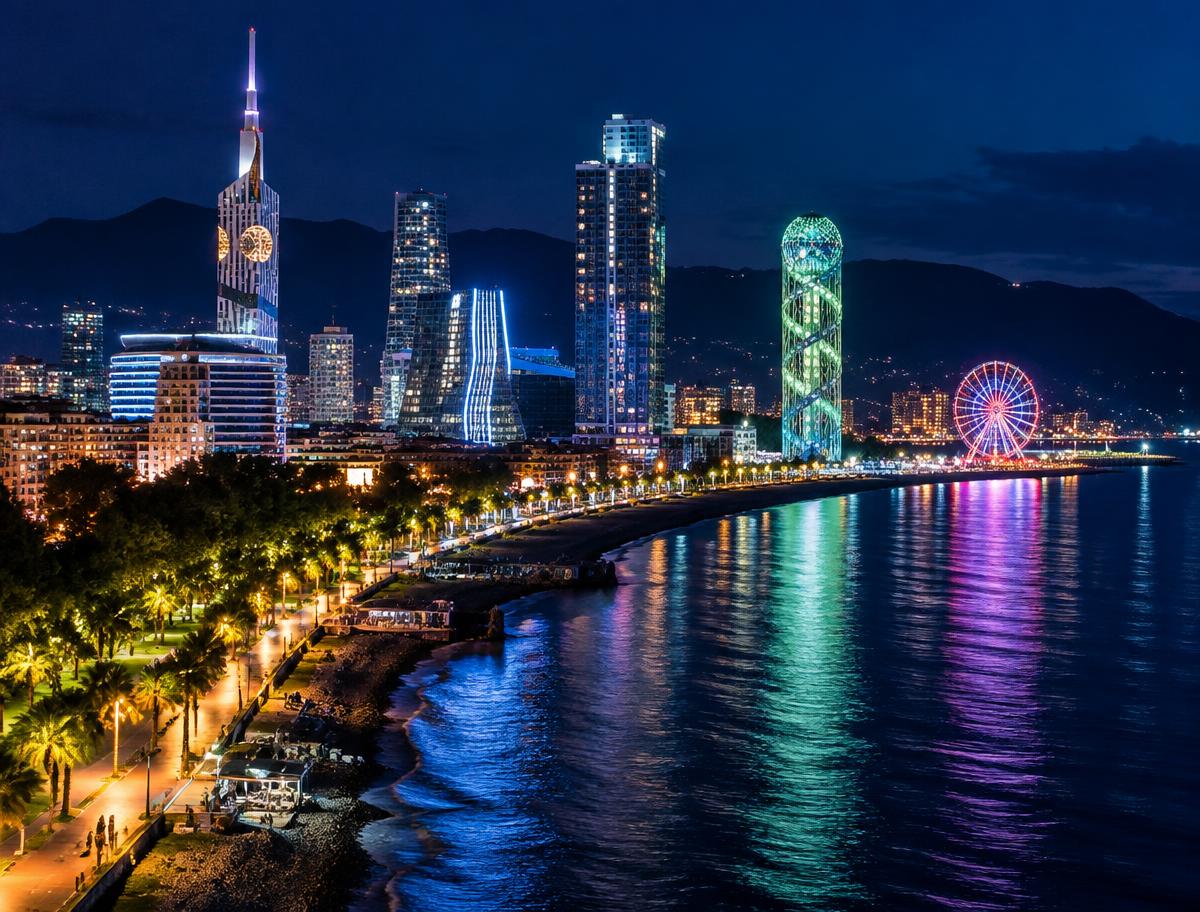 Batumi skyline and Black Sea coastline lit up at night